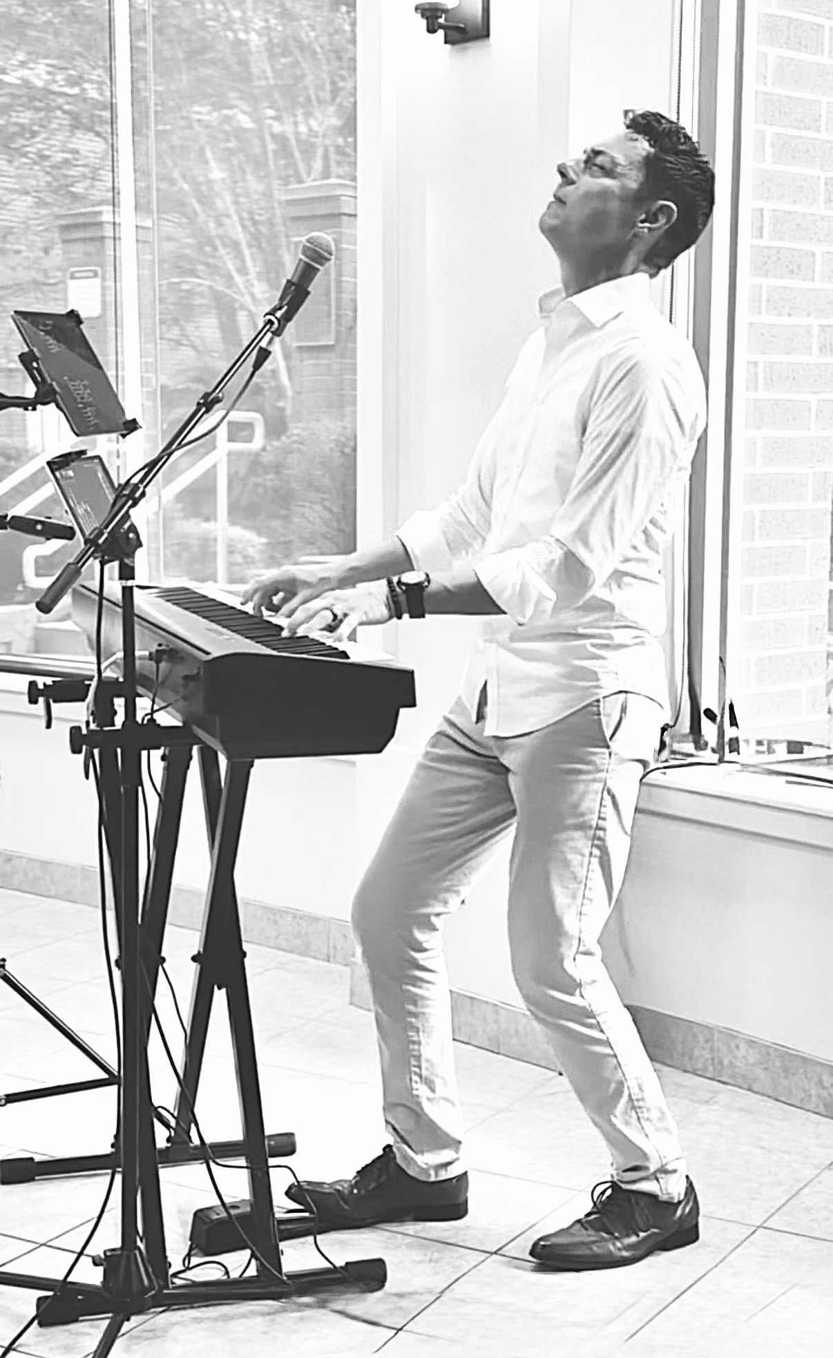 Calvin Gainey leading worship from the keyboard
